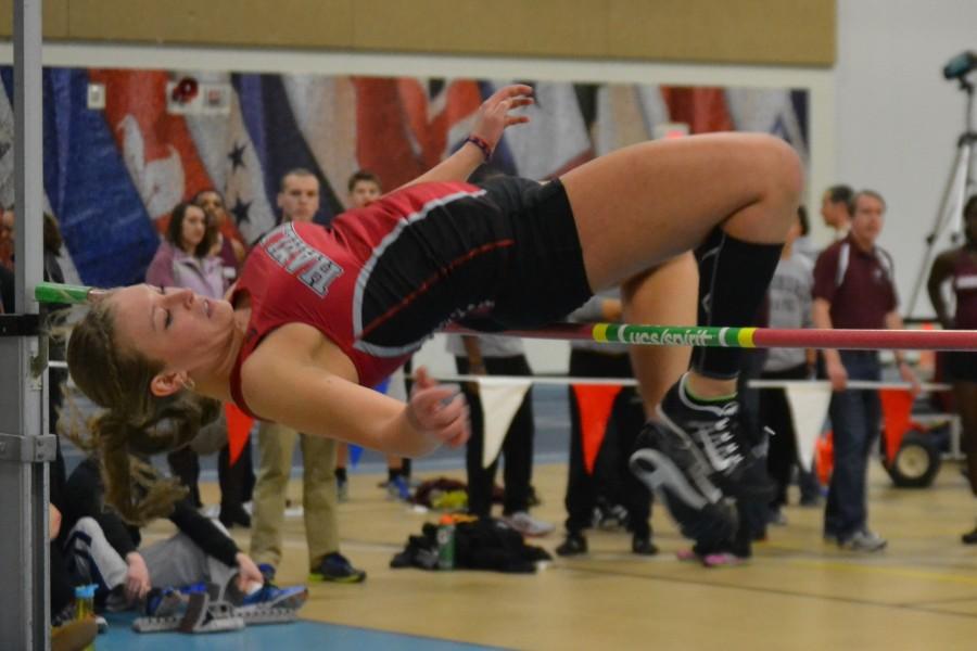 First-year Merina Lenz gets great height on jumps at the pre MIAC meet hosted by Macalester on Feb. 28.
(Photo by Gino Terrell)