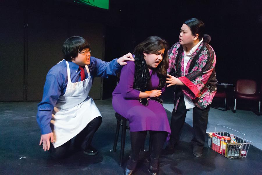 Left to right: First-year Lee Mai, junior Kyrie Carlson and senior Phasoua Vang act in Hamline Theatre’s play “Crocodile Seeking Refuge,” which
tells the story of refugees in search of asylum in the United Kingdom.