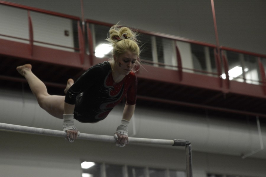 Sophomore Emilie Giefer looks to show off her skills on the Uneven Parallel Bars.