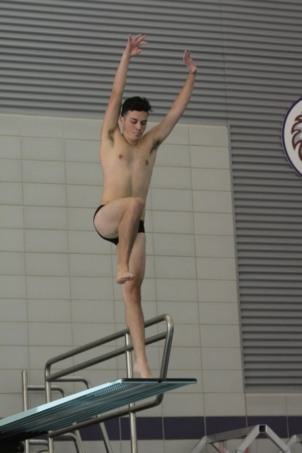 The Hamline Pipers first-year standout diver Skiah Garde Garcia on the platform daring another dive.