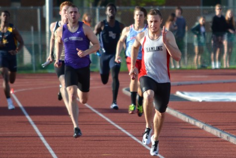 Junior Tom Larson running in the mens 4x400 Meter Relay, an event the Pipers came out on top, at the MIAC Outdoor Championships at Macalester College on May 9, 2015.