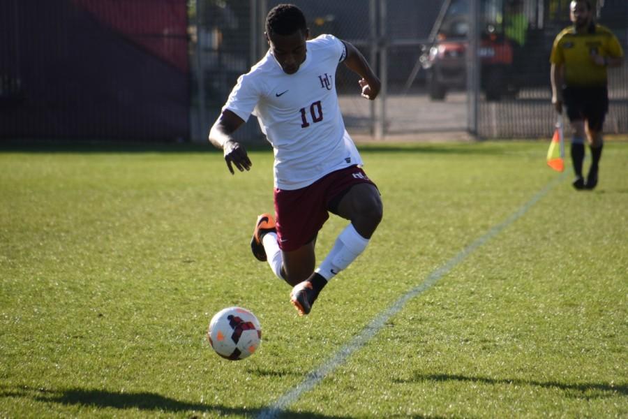 Abbai Habte saving the ball from going out of bounds in the first half of last Wednesday’s game against Carleton.
