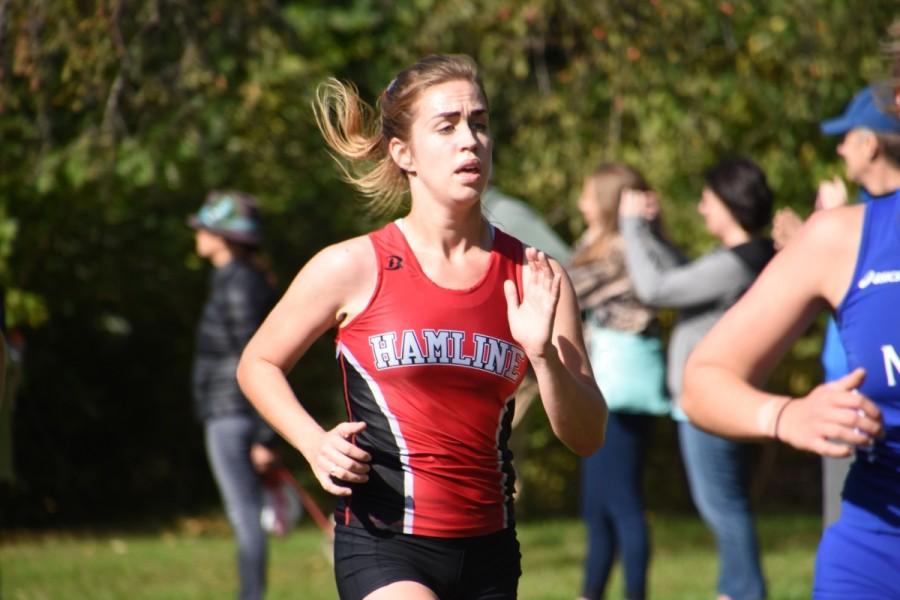Sophmore Meg Griffin finds her stride at the St. Kate’s meet on Saturday, Oct. 10.