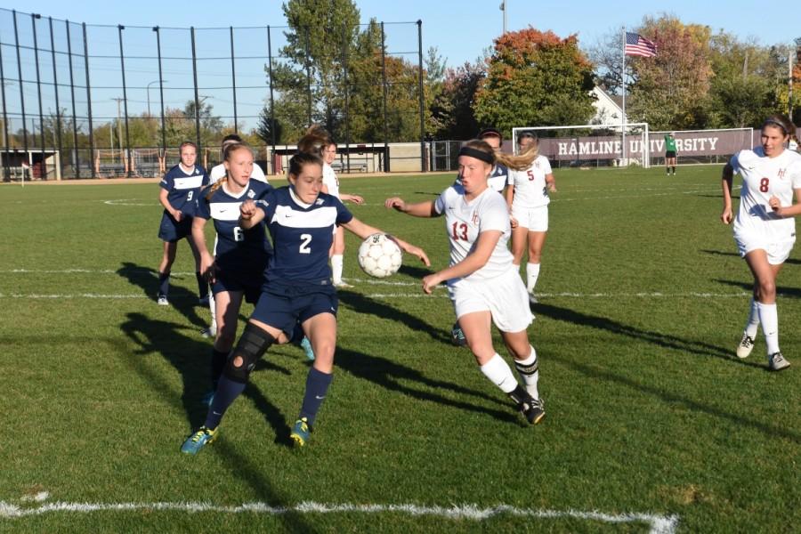 Senior Aubrey Stenson chases after the ball during the Pipers 0-1 home loss to Carleton on Tuesday, Oct. 13.
