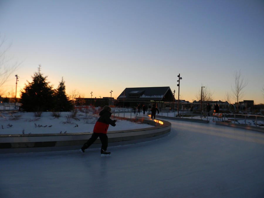 Skaters whiz along the newly opened, 810-foot-long skating loop at the Central Park of Maple Grove. 
