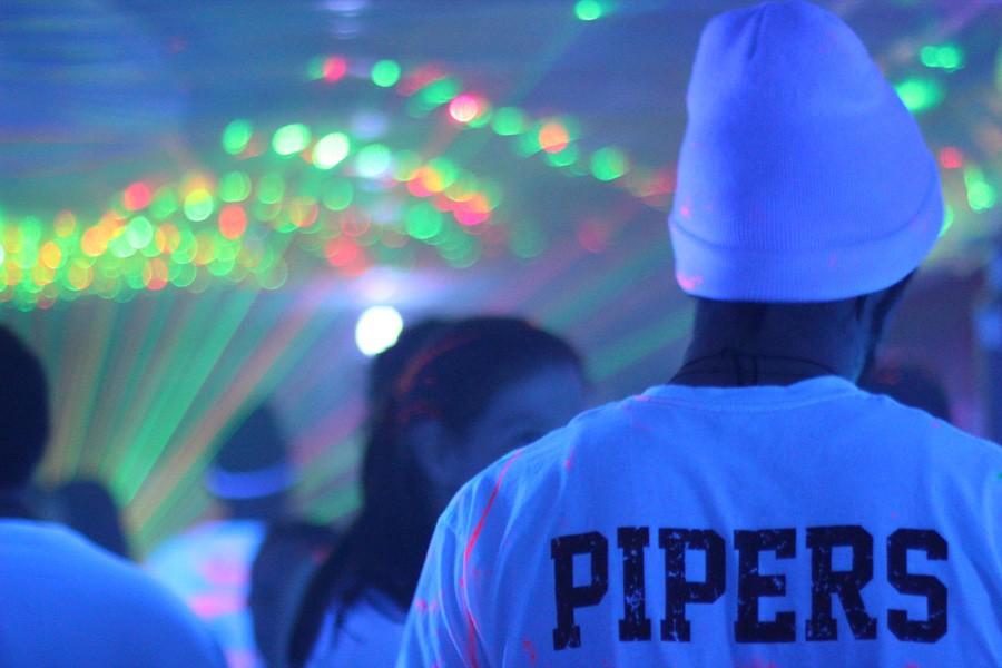Hamline students packed into the Theta Chi Fraternity house on Friday, Feb. 26 for their blacklight paint party. The alcohol-free event showcased the fraternity for campus recruitment.