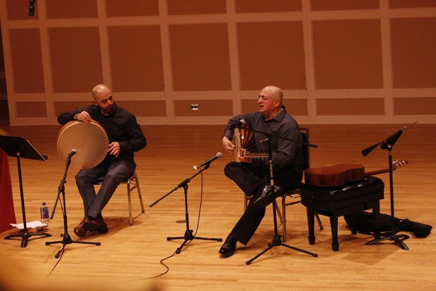 Palestinian composers Issa Boulos (right) and Wanees Zarour (left) play some of Boulos music for listeners in Sundin Hall.