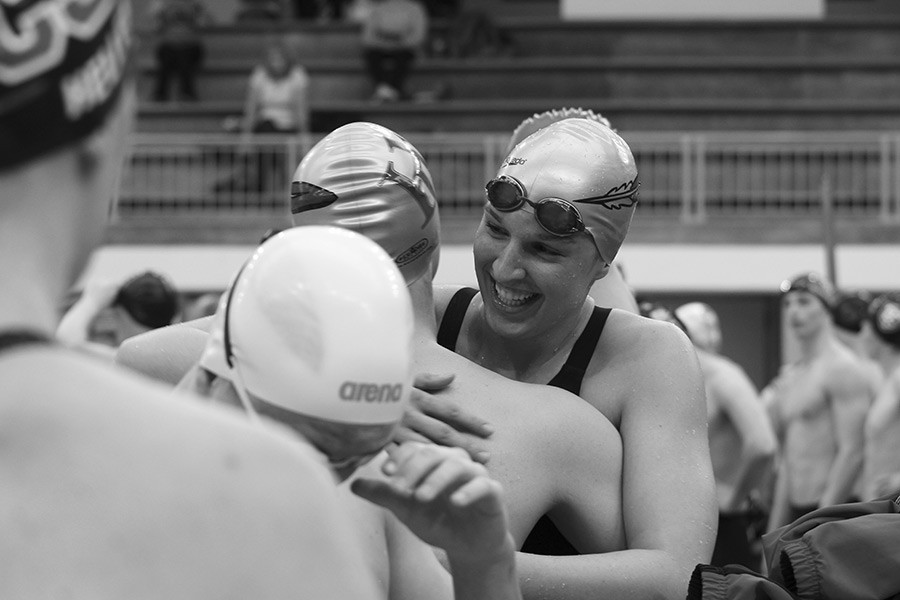 First-year Taylor Martinek celebrates her eighth place finish in the 50 meter women’s freestyle.