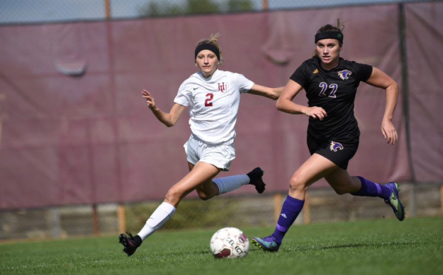 Junior Forward Anna Futterer in pursuit of the ball during the game against St. Kate’s at Paterson Field earlier this season.