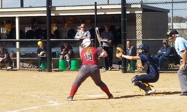 First-year infielder Caitlin Jones watches a pitch go by in Hamline’s 6-5 victory over Carleton last Saturday. Jones went 0-2 with a walk in that game.