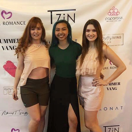 Vang (center) showing her designs on two models Michele Reboita Soares (left) and Morgan Miller (left).