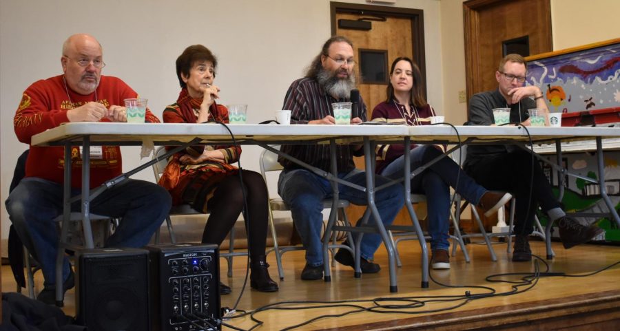 Twin Cities adjunct faculty spoke to an audience at Hamline Public Library on April 27. Pictured from left are Peter Rachleff, Catherine Guisan, David Weiss, Mary Pogatshnik, and Travis Sands.