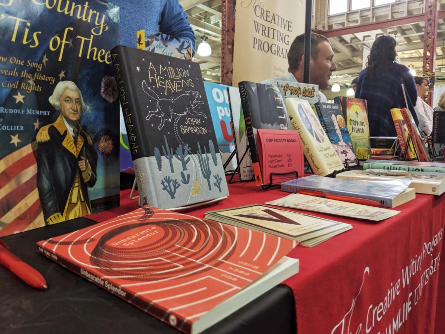 Hamline professor and author John Brandon signed books at Hamlines booth during the 2019 Twin Cities Book Festival on Oct. 12.
