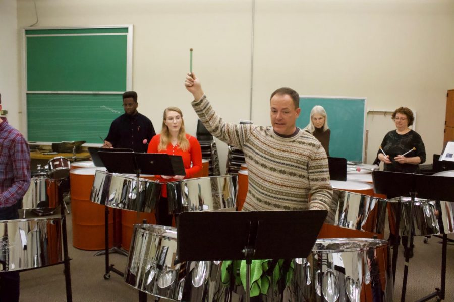 Jermey Kunkel instructs the class on playing with only one hand.