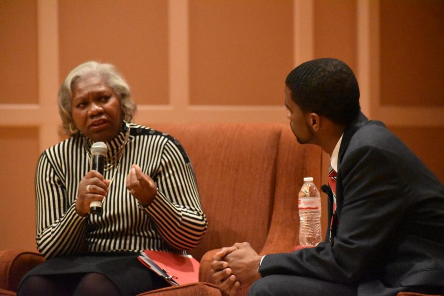Hamline President Dr. Fayneese Miller reads questions asked by students, asking St. Paul mayor Melvin Carter about his views regarding the environment, the growth of St. Paul and the true nature of liberty during an event on Feb. 12.