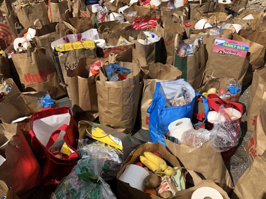 Several paper bags of groceries collected as donations
