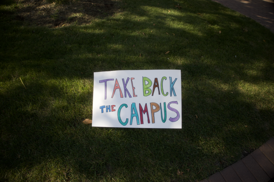 Handmade signs decorated Alumni Way for Take Back the Campus on Sept. 29.