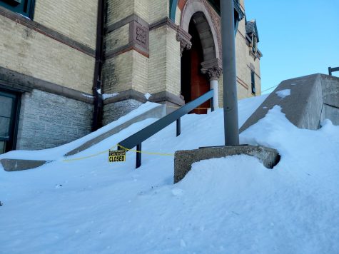Accessibility to Old Main is compromised
when hefty amounts of snow block the side staircases to the
front enterance.