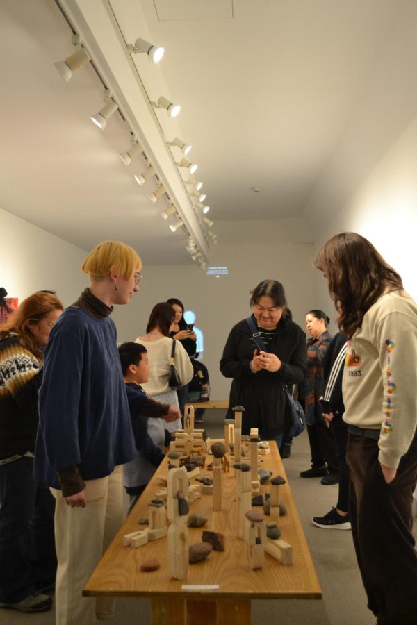 Interactive exhibits included senior Gracee Hurley-Brown’s block and
rock table, which explicitly encouraged attendees to pick up and play
with the displayed figurines.
