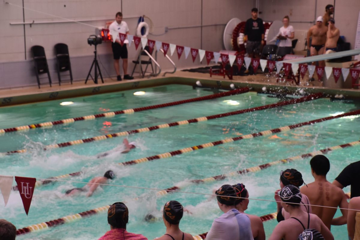 Swimmers+stroke+neck+and+neck+in+a+contested+heat+at+the+Hamline+Relay+Invite.