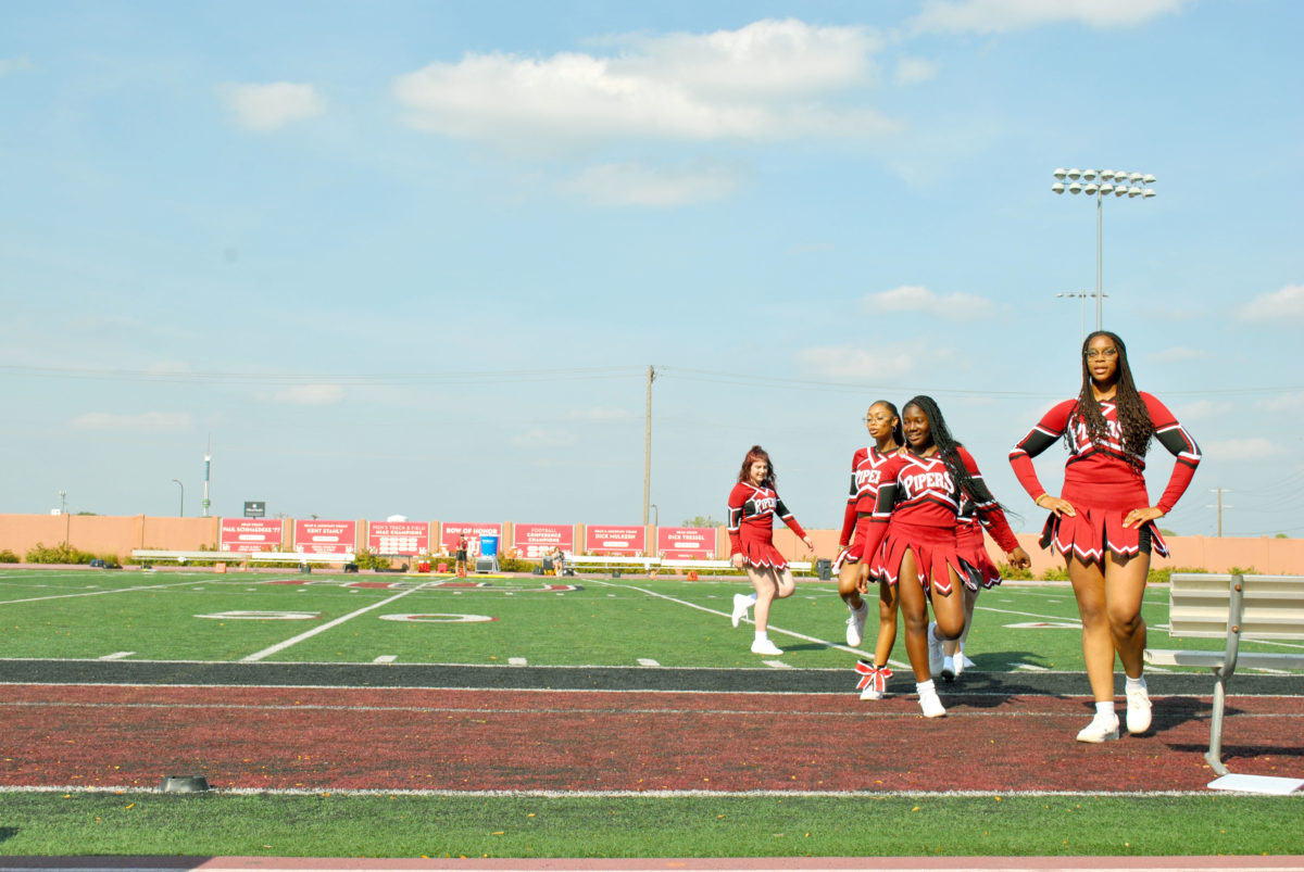 Hamline’s Cheer Team, the Cheerios, performed a special halftime performance during the Homecoming football game this year for the first
time. In past years, New Student Programs has performed at the halftime show.