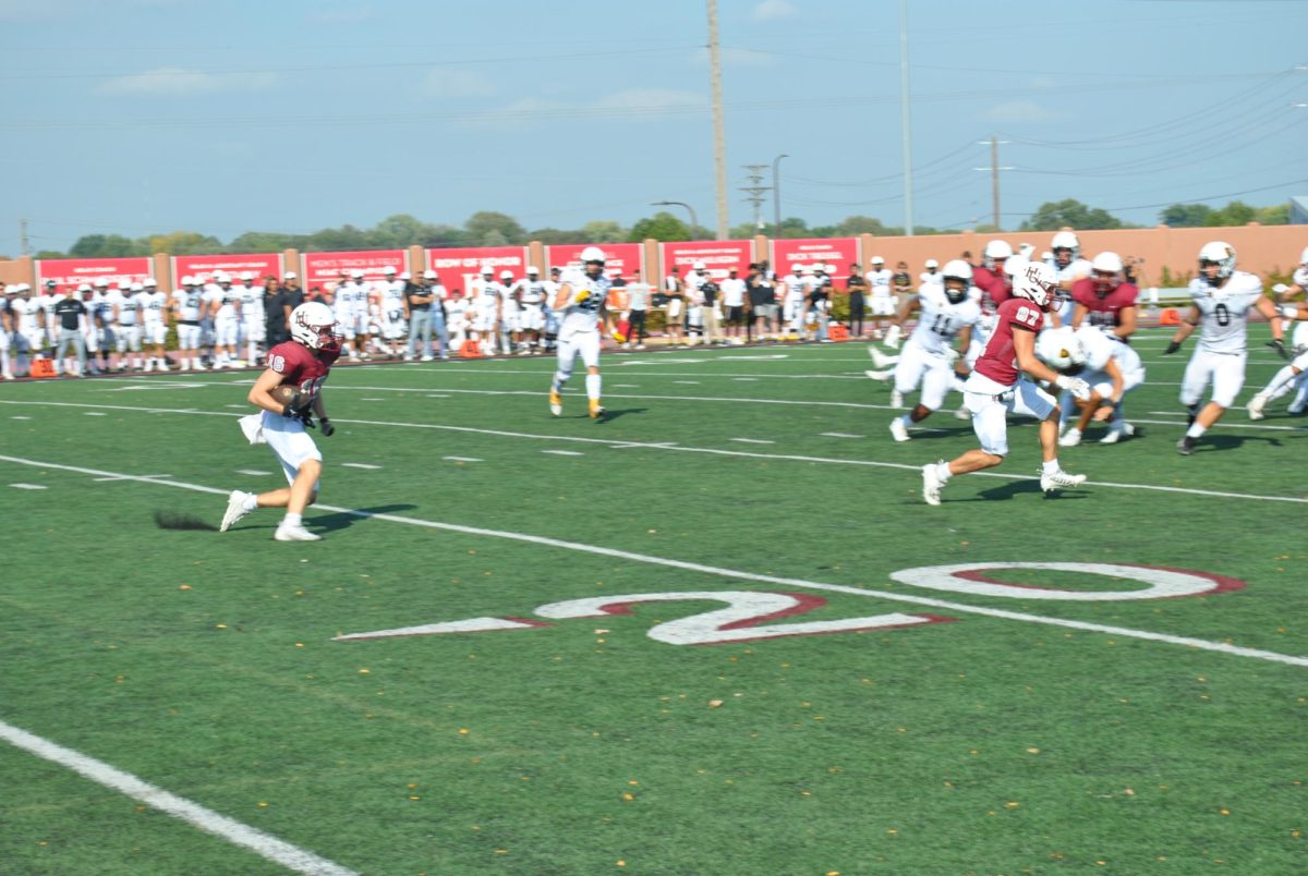 Sophomore Eric Pfenning-Wendt cuts to the outside on a return play for a big gain.