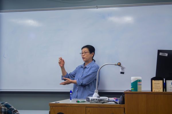 Professor Suda Ishida delivered a speech at a We Are Not Robots or Numbers (WARN) event
