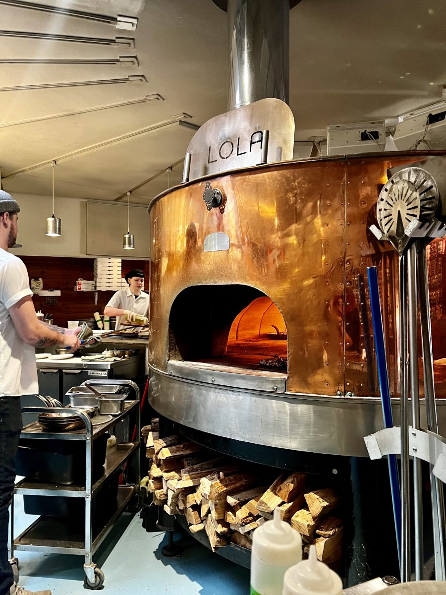 The iconic copper pizza oven.