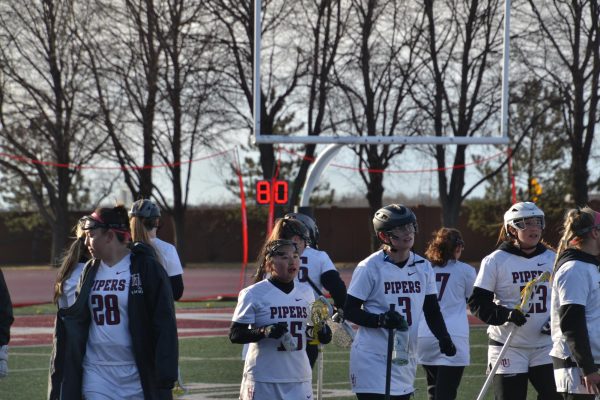 Pipers return to the sideline following a tough 6–16 loss versus St. Benedict at Klas Field on Wednesday, March 20.