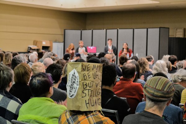 Many constituents of the Hamline-Midway neighborhood attended the town hall to raise attention on issues they cared about to local politicians. One constituent wore a paper bag during the event reading, "We may be ugly...but we still get hungry".