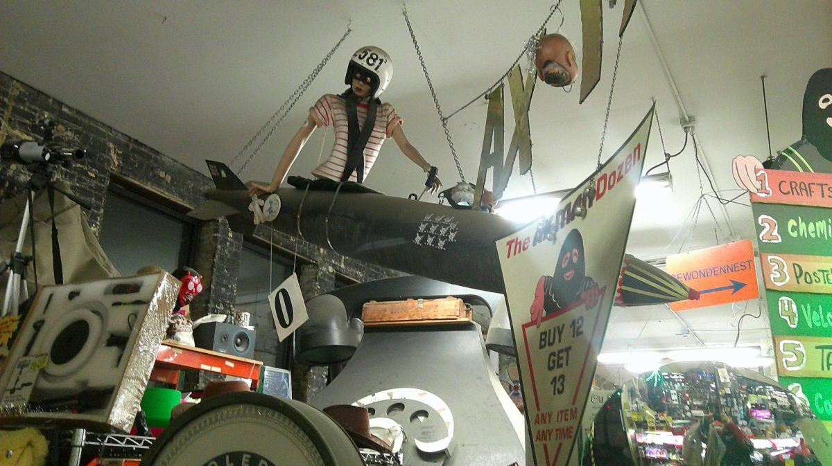 A mannequin riding a torpedo greets patrons of Ax-Man at the front door and is one of the many fun and creative objects they have hanging from the ceiling.