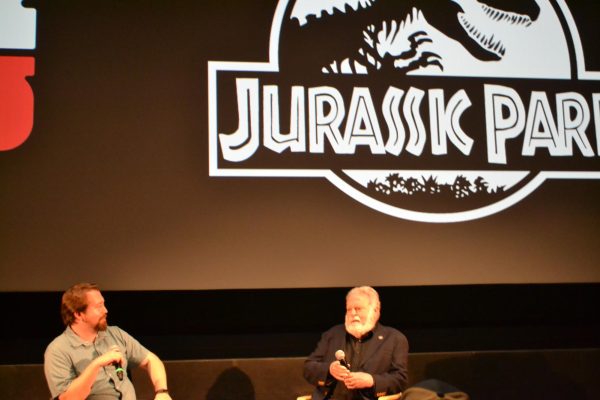 Ferguson Sauvé-Rogan (left) interviewing Hollywood cinematographer Dean Cundey (right) on work in "Jurassic Park."