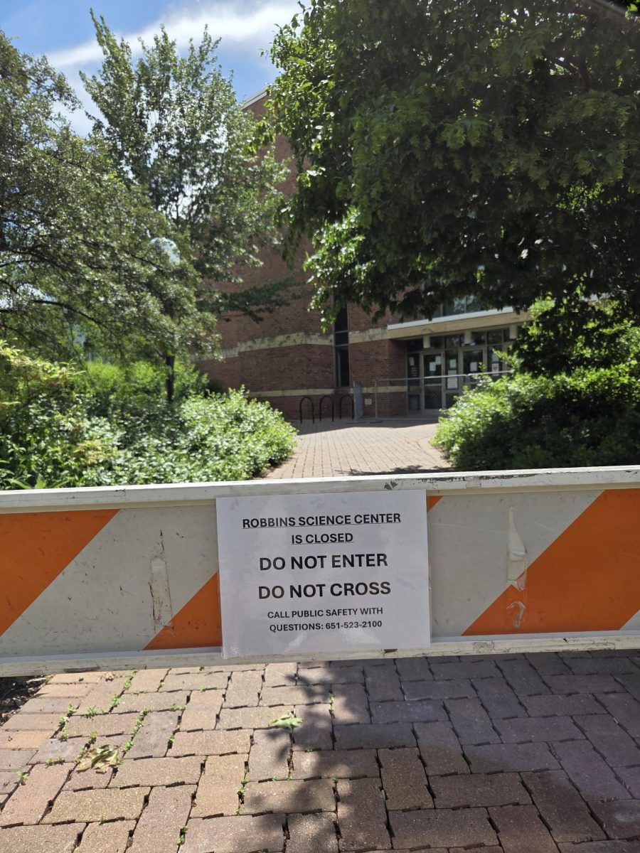 Robbins Science Center is closed until further notice following the school bus crash. Barricades have been put up around the building entrance with signs reading "Do not enter" and "Do not cross".